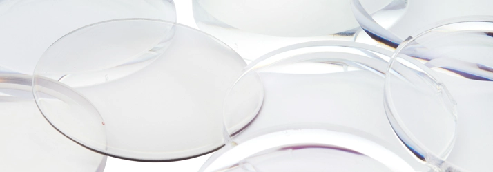 Numerous contacts laying on a white table.